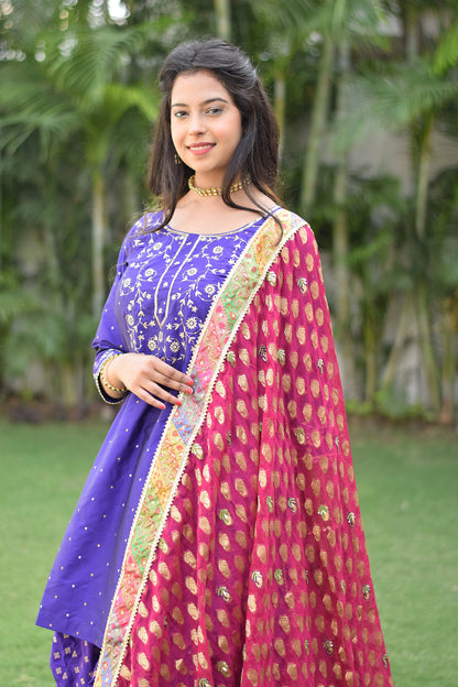 An Indian Girl wearing Purple Silk & Multicolored Brocade Farshi Gharara Set