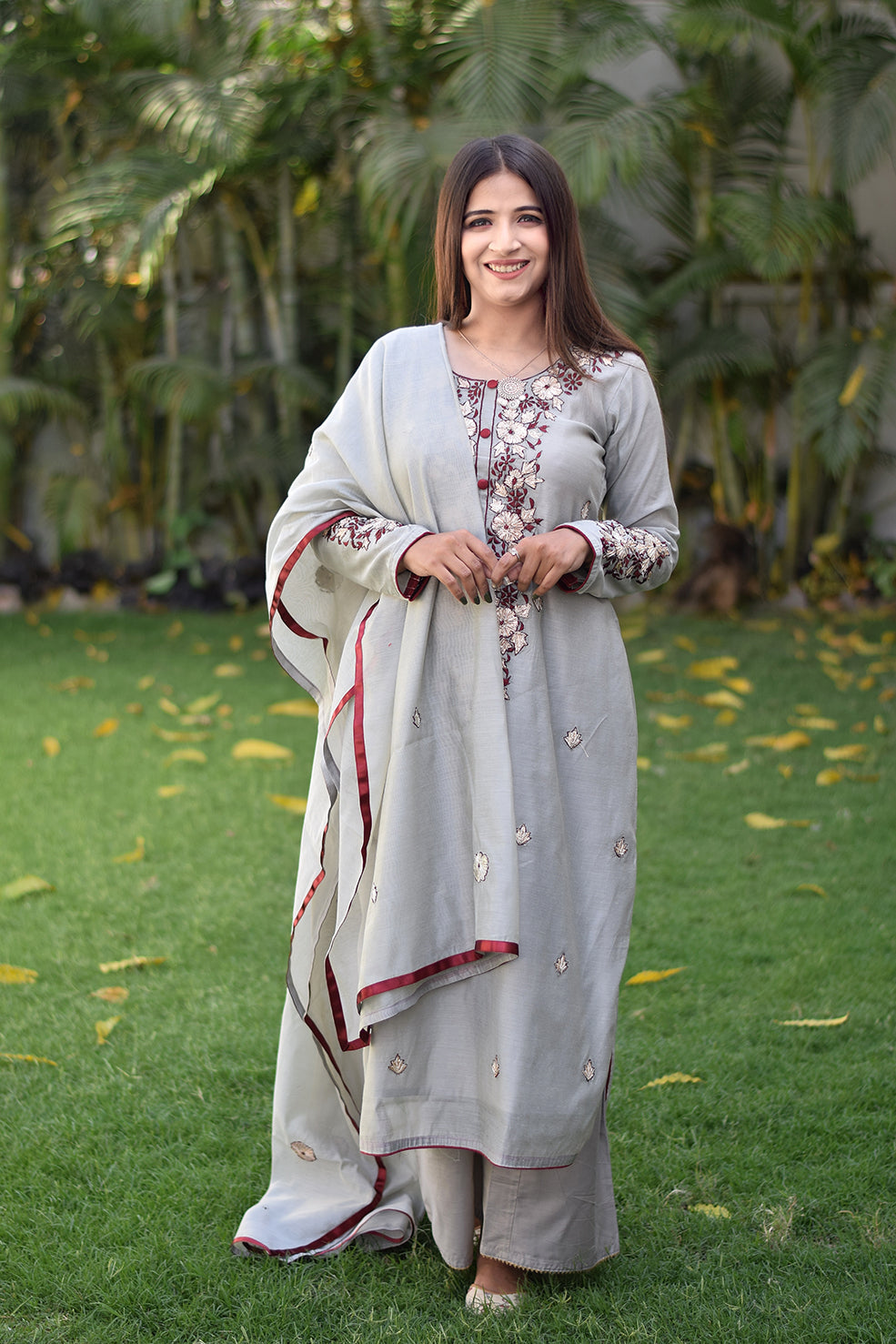 Indian women presenting gota patti work suit