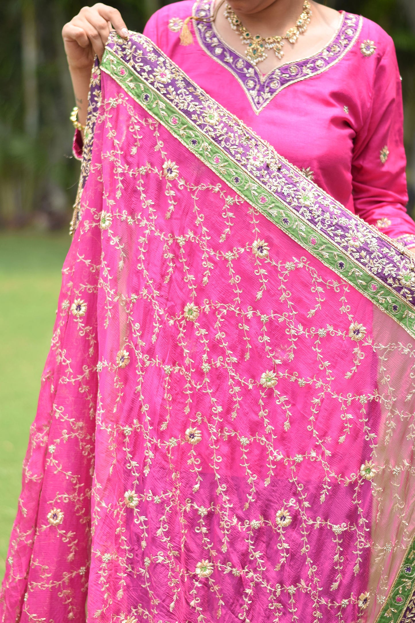 Graceful bride dressed in Magenta & Purple Bridal Kamkhab Farshi Gharara Set With Zardozi Work