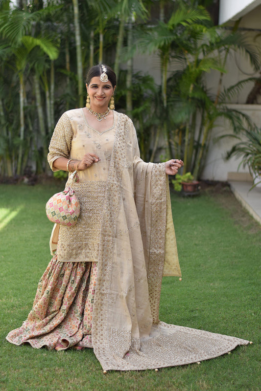 Indian women wearing multicolored bridal gharara brocade work