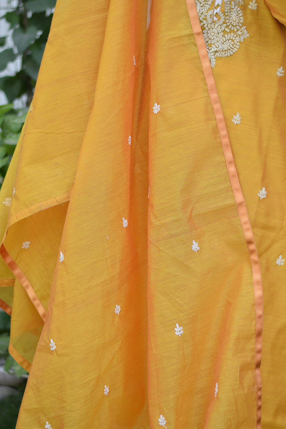 Indian women wearing yellow designer kurti palazzo set