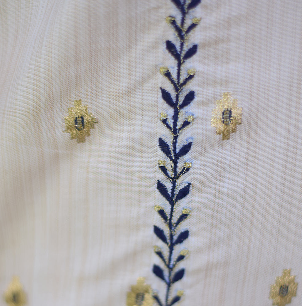 A sophisticated Indian woman dressed in a minimalistic Off-White Silk Kurta.