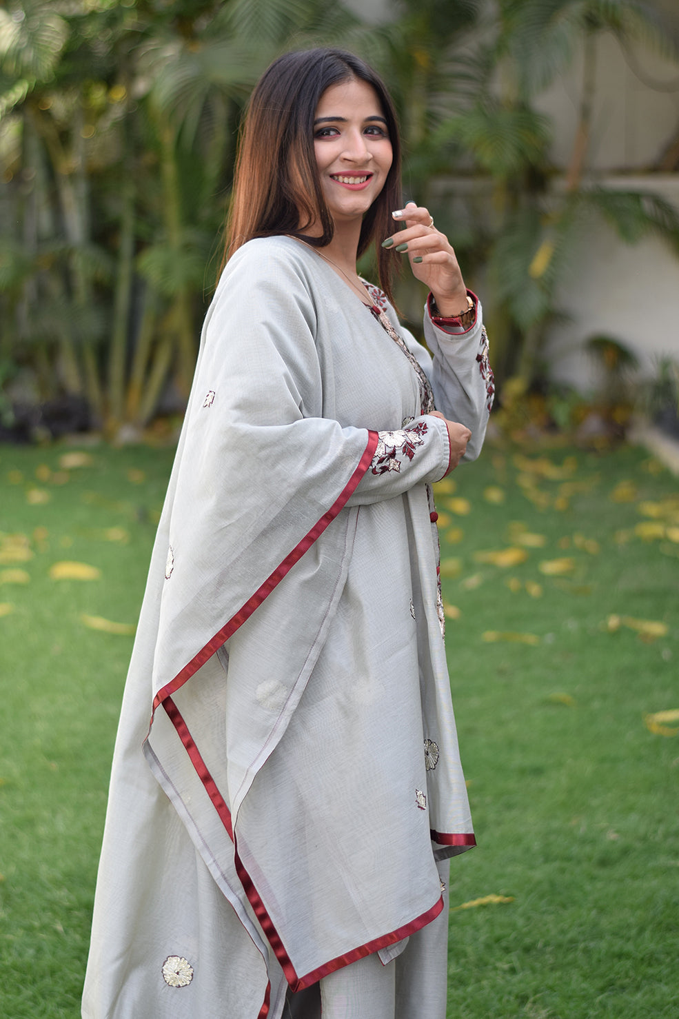 Indian women presenting gota patti suit latest design