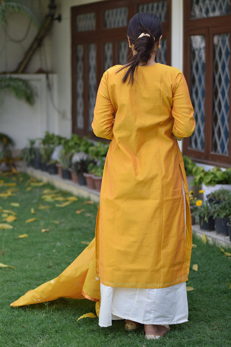 Indian women wearing yellow latest kurti with palazzo set