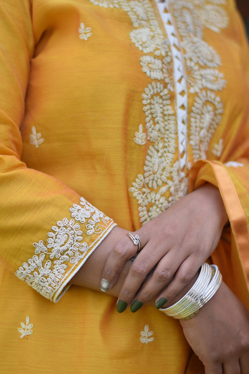 Indian women wearing yellow kurta palazzo dupatta set 