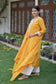 Indian women wearing yellow embroidered palazzo kurta set