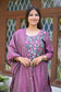Indian women wearing purple embroidered kurta