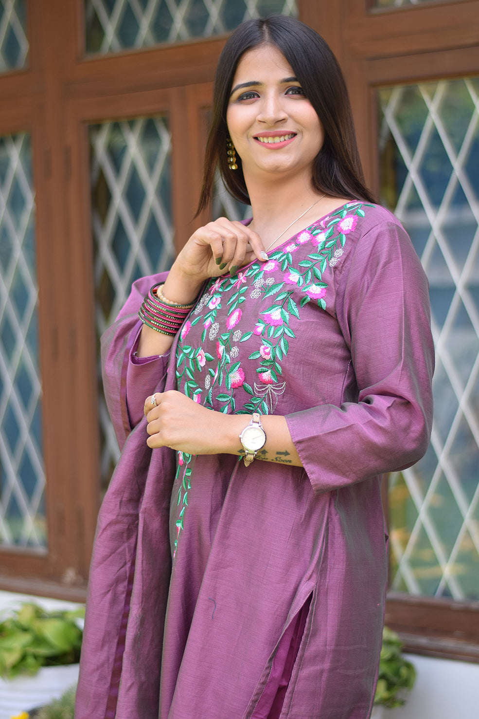 Indian women wearing hand embroidery designs for kurtis
