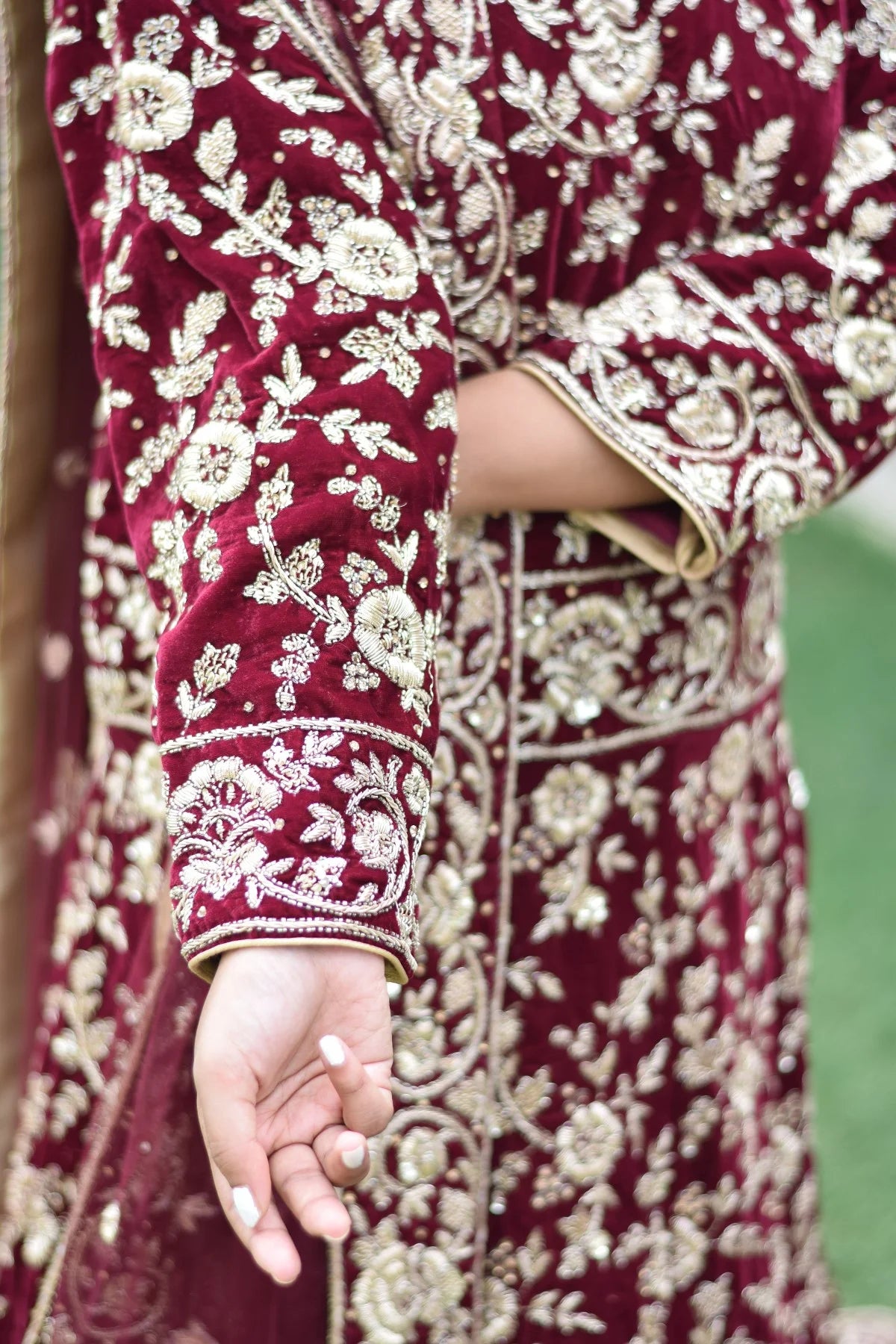 The Trail Gown in maroon is a popular choice among Indian women for its sophisticated design and rich color, as showcased here.