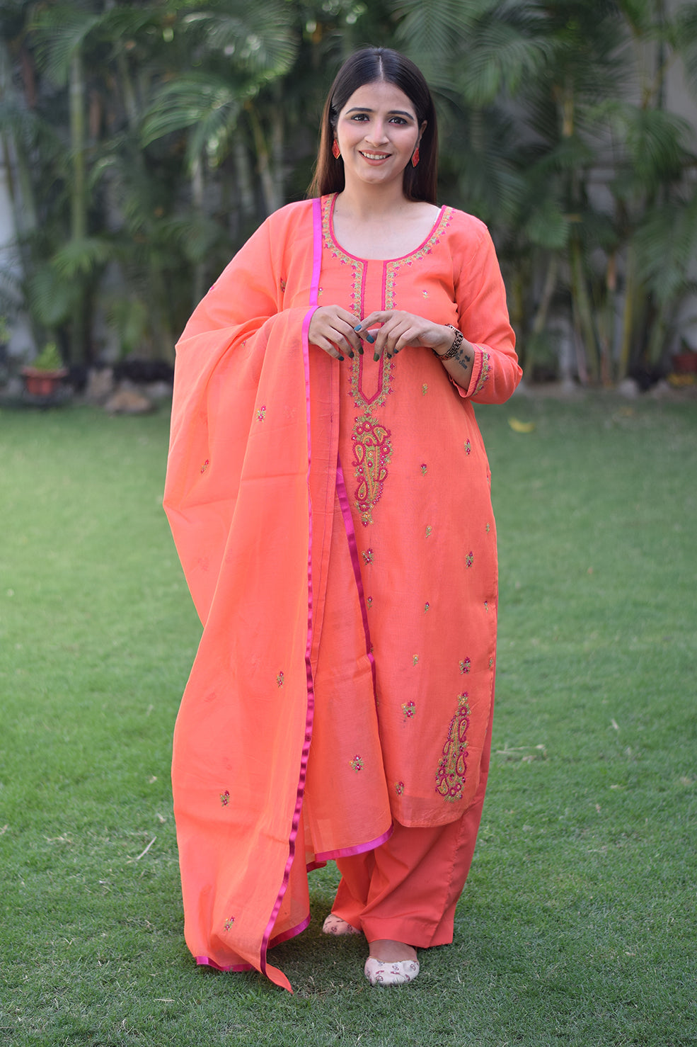 Indian women wearing embroidered kurta 