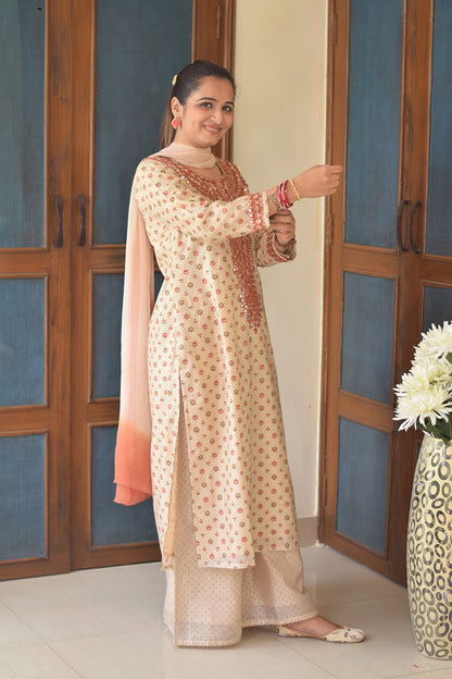 Women showing beige kurti design