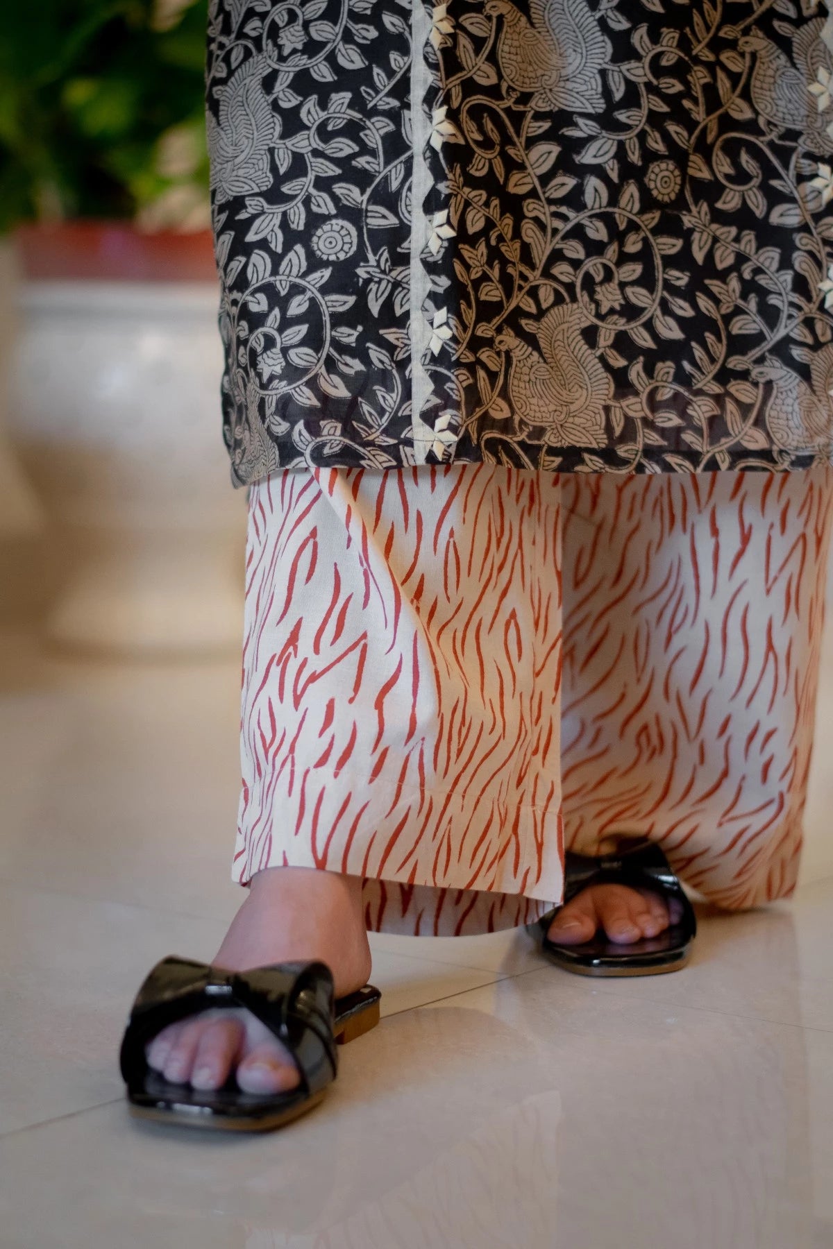 Indian women wearing kalamkari print kurta